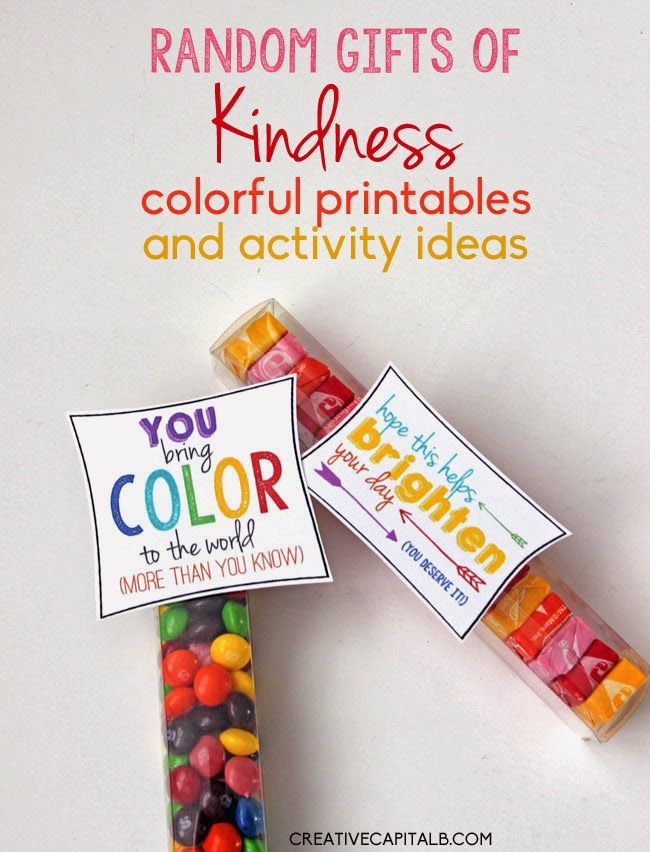 two candy sticks with colorful candies in them and the words random gifts of kindness