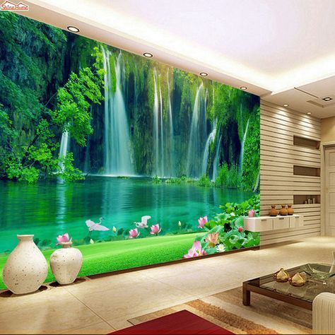 a living room with a waterfall and flowers on the wall