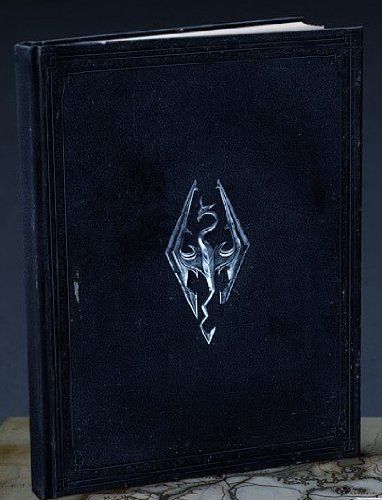 the elder scrolls book is sitting on top of a marble table with an intricate design