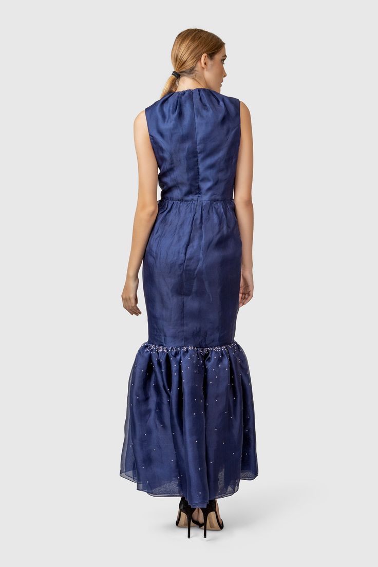 A gorgeous full length blue silk dress is unique for all the formal parties this fall. It is also an eco friendly cocktail dress option with fabric used being silk, lining organic cotton and manually colored using ago free dye. It is also perfect if you are looking for a wedding guest outfit or a cocktail dress for any special occasions irrespective of the season. We hand place every single glass bead to give a water drop effect for fairy tale mood. We can custom make this dress as per your need Artisanal Design, Formal Parties, Blue Silk Dress, Silk Cocktail Dress, Blue Silk, Guest Outfit, Water Drop, Handmade Design, Wedding Guest Outfit