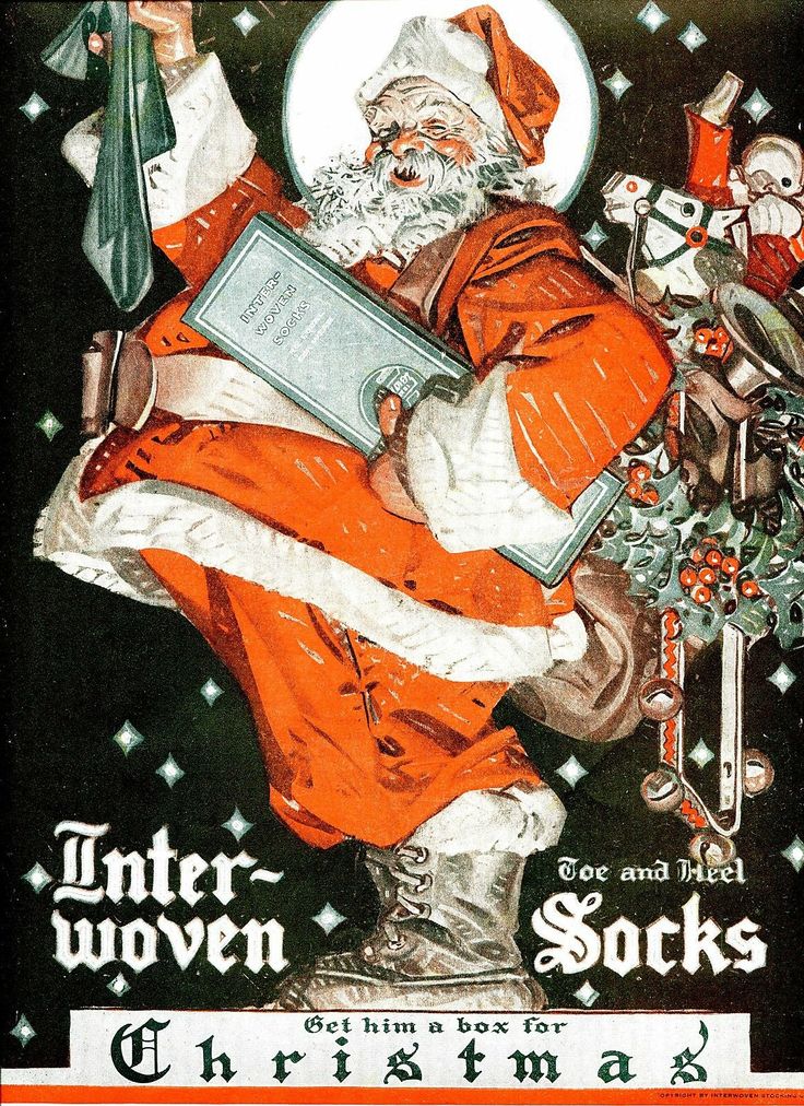 an old fashioned christmas card with santa holding a book