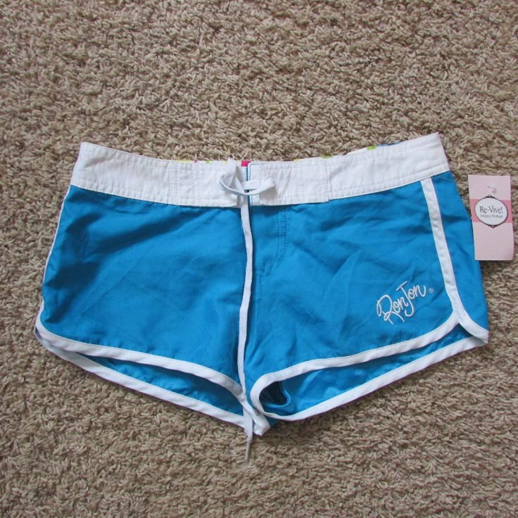 Nwt Ron Jon Surf Shop Aqua Blue White Size 1 Swim Bottom Cover Up Shorts Velcro Fly, Ties At Waist, Back Pkt Polyester Inseam: 1.5" 15" Waist Laying Flat Across Smoke Free Home Blue Swimsuit Cover Up, Tropical Clothes, Trashy Outfits, White Swim, Tankini With Shorts, Ron Jon, Ron Jon Surf Shop, 2000s Clothes, Surf Shorts