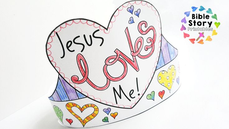 a paper heart with the words jesus loves me written on it and hearts in different colors