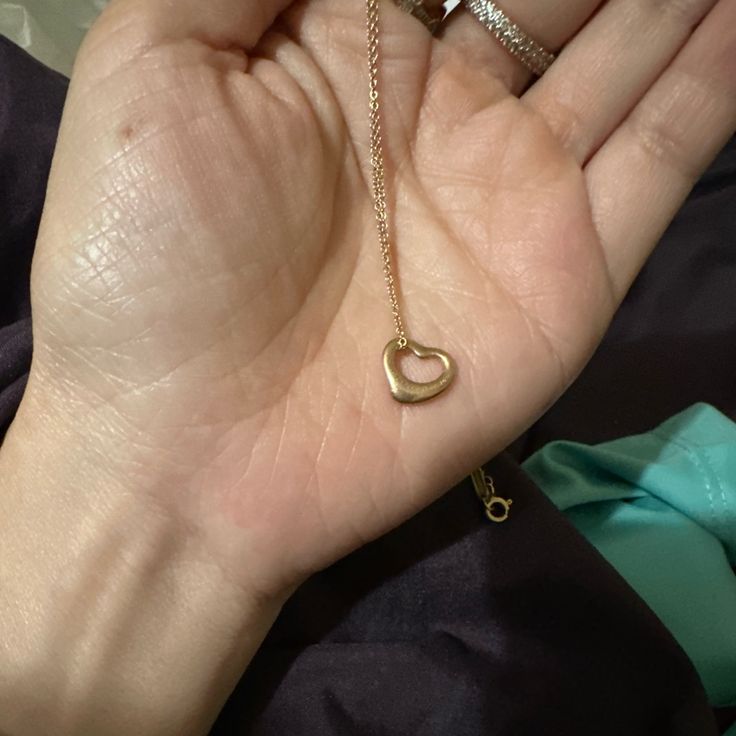 Authentic Rose Gold Open Heart Necklace. Price Is Firm. Authentic, Used Condition Of Course. Clasp Is Stamped Peretti And Tiffany And Co 750. May Need Some Cleaning/Polishing Since It’s Been Stored Away Serious Inquiries Only And No Low Offers. No Returns/Sold As Is. Please Don’t Waste My Time And Only Message Me If You Are Really Interested Purchasing This. I Recently Got Robbed/Attacked So I Need To Sell My Personal Items To Help Cover My Losses/Medical Expenses. Please Do Ask Questions Before Purchasing.Thank You. Elegant Heart Cut Necklace For Party, Formal Heart Cut Rose Gold Necklace, Luxury Heart-shaped Necklace For Formal Occasions, Luxury Heart Shaped Necklace For Formal Occasions, Luxury Heart Necklace For Formal Occasions, Formal Heart-shaped Rose Gold Necklace, Formal Heart Cut Necklace, Elegant Heart Pendant Necklace For Formal Occasions, Elegant Open Heart Jewelry For Party