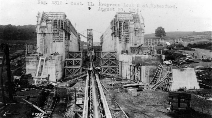 an old black and white photo of train tracks