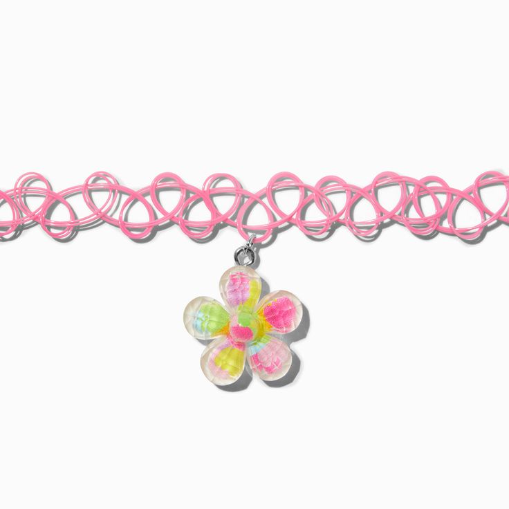 a pink bracelet with a flower charm on it