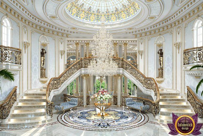 an ornately decorated foyer with chandelier and stairs