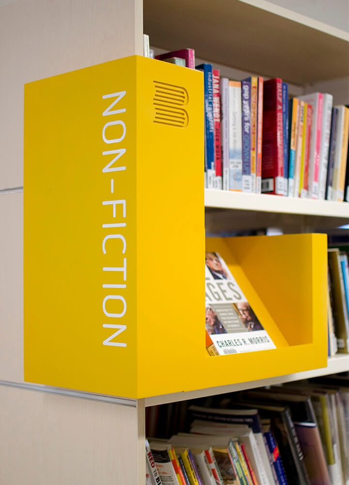 there is a yellow box on the book shelf