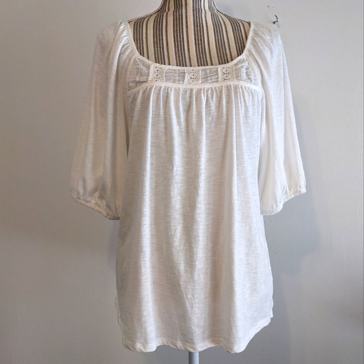 For Size Reference, This Is Modeled On A Small Mannequin, This Is Size Large, So You Can See It's Very Roomy. Smock Style With A Yolk In The Back And The Front With Light Gathering Underneath. The Sleeves Are Set In At An Angle And Are Part Of The Shoulder, Comes Down To Just About The Elbow, Loose Elastic Around The Edge. Cute Square Neckline, Loose Fit In The Body With A Boxy Shape. Cotton And Modal, White With Little Streaks Going Through It, Lightweight And Soft. Pit To Pit Is 21", Size Larg Boho Long Sleeve Top, Going Through It, Small Mannequin, Boho Peasant Top, Spring Vacation, Long Sleeve Floral Top, Floral Sleeveless Top, Smock Top, Pleated Blouse