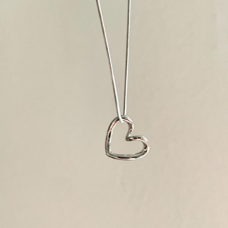 - This simple sweet style necklace is made of stainless steel chain, and stainless steel heart pendant. - Great for bestie necklaces.  - Stainless steel, tarnish free.  - Super simple and dainty, goes well with all your outfits! - length:  15 inches +2 inches of extender chain.  -  -Shipping: All orders will be shipped out within 1-2 business days after the order has been received. Ship from New York, United States. USPS first class mail on this order. 🚗 - Thank you for visiting my listing. - For more cute necklaces: https://www.etsy.com/shop/Funbeadsbygrace1?ref=dashboard-header&section_id=50341900 -  Follow us on Instagram: funbeadsbygrace for more beautiful creations and updates on the shop! Everyday Minimalist Handmade Heart Necklace, Minimalist Handmade Heart Necklace For Everyday, Everyday Handmade Heart Pendant Necklace, Handmade Everyday Heart Pendant Necklace, Simple Silver Heart Pendant Necklace, Minimalist Metal Necklaces For Valentine's Day, Silver Stainless Steel Heart Necklace, Minimalist Silver Heart Necklace, Simple Silver Heart Charm Necklace