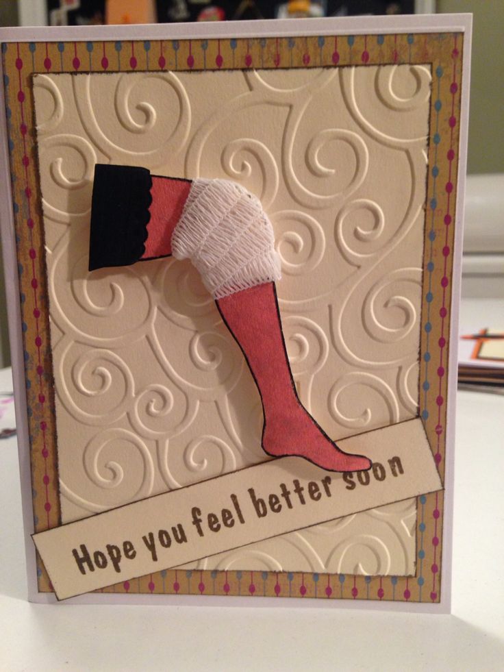 a close up of a greeting card with a sock on the front and words hope you feel better soon