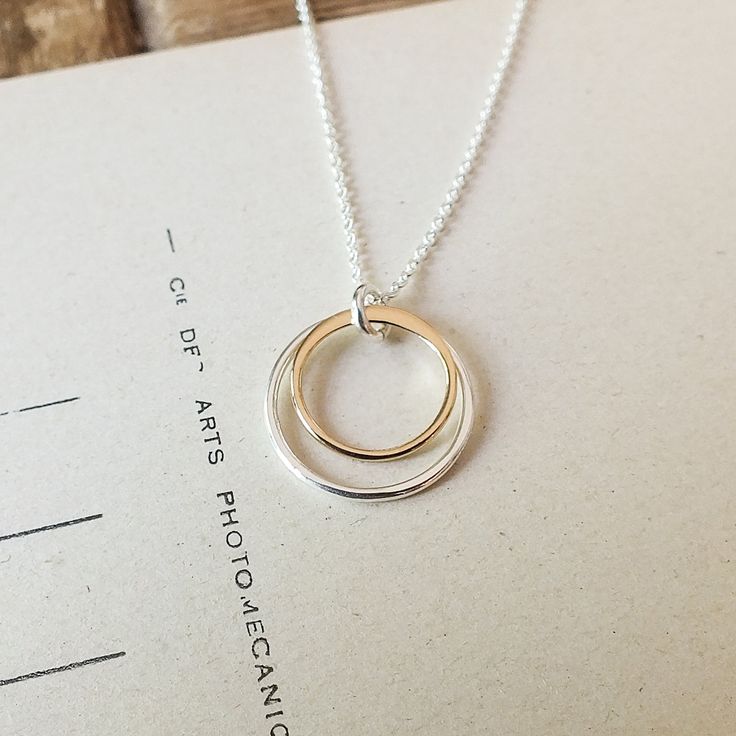 This simple necklace is a meaningful reminder that you are always surrounded by love. Wear as a daily reminder or gift to someone special. Message: You are surrounded by love. Silver And Gold Rings, Surrounded By Love, Message Necklace, Jewellery Box Making, Love Deeply, A Daily Reminder, Circle Necklace, Knot Necklace, Love Necklace