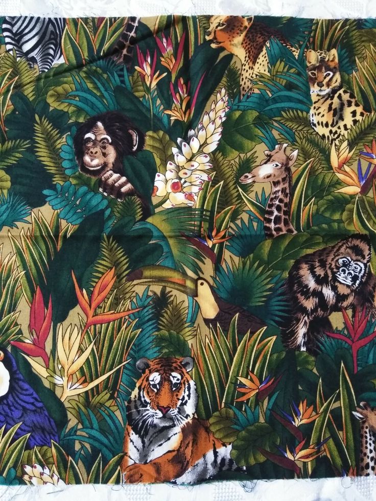 an image of jungle animals on a green background