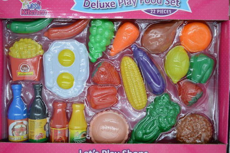 a play food set in a pink box