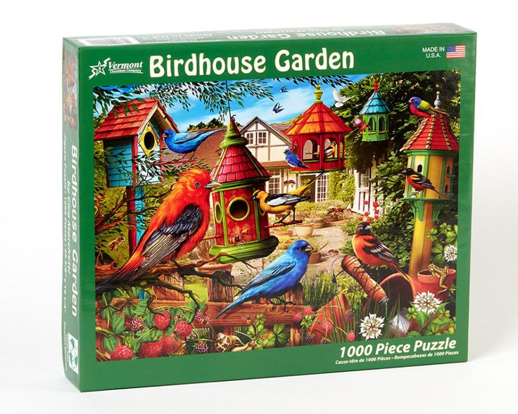 the puzzle box is filled with colorful birdhouses and birds perched on top of them