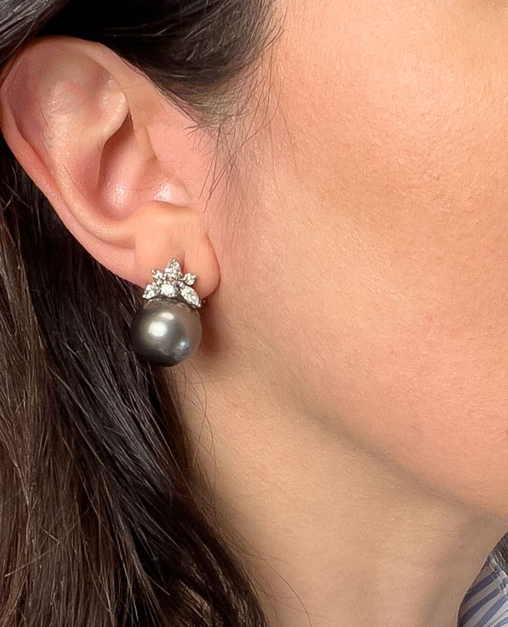 14K white gold earrings with marquis, round and pear shape diamonds weighing 1.60 carats total and two black Tahitian South Sea pearls measuring approximately 14.03mm each. ✈️ Choose free shipping at checkout ☎️ Call 201-722-0216 with questions 💭 Chat with us live! Bottom right corner of your screen Luxury Elegant Pearl Earrings With Tilla, Luxury Pearl Earrings For Evening With Prong Setting, Luxury Evening Pearl Earrings With Prong Setting, Luxury Round Pearl Earrings In Fine Jewelry Style, Luxury Pearl Earrings With Prong Setting For Evening, Tahitian Pearl Earrings Studs, Luxury Gray Tahitian Pearl Jewelry, Luxury Pearl Jewelry With Pierced Design, Luxury Tahitian Pearl Earrings For Formal Occasions