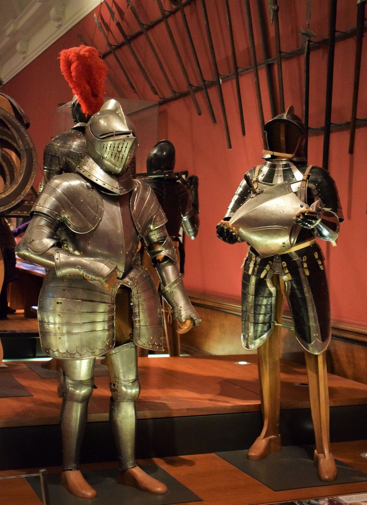 two knights in armor standing next to each other