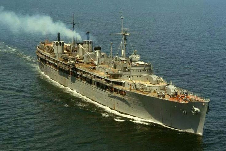 an aerial view of a large ship in the water