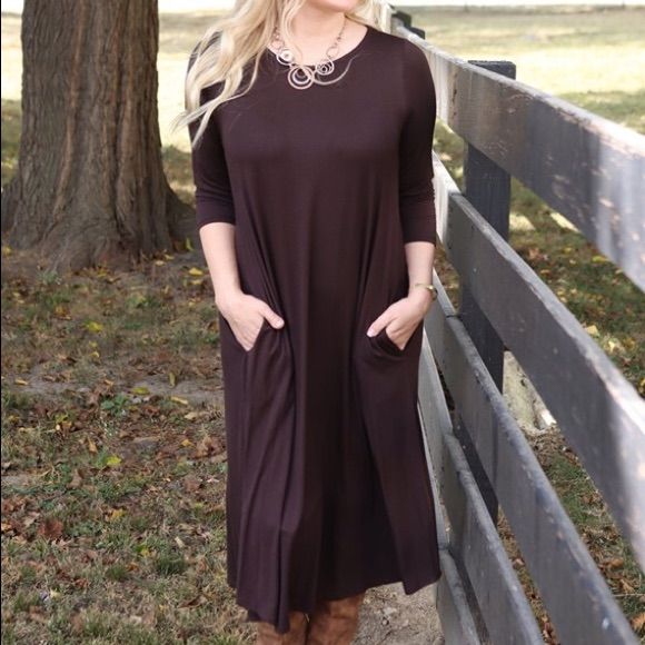 Figure Flattering Silhouette 3/4 Length Sleeve Chocolate Color Midi Dress Fall Dresses With 3/4 Sleeves, Casual Half Sleeve Maxi Dress For Fall, Fitted Midi Dress With 3/4 Sleeves For Fall, Half Sleeve Dresses For Fall Day Out, Casual 3/4 Length Fall Dresses, Casual 3/4 Length Dresses For Fall, Chic 3/4 Sleeve Fall Dresses, Elegant Half Sleeve Maxi Dress For Fall, Elegant 3/4 Sleeve Maxi Dress For Fall