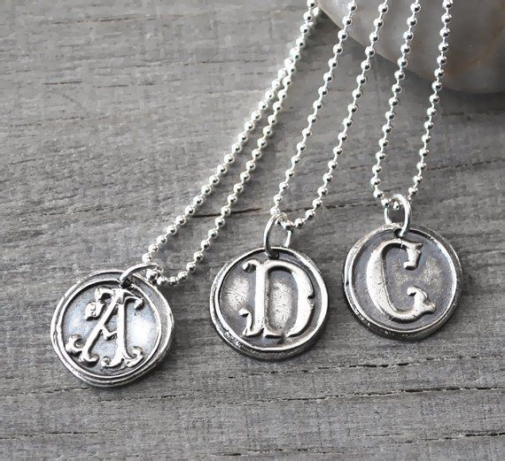 "Personalized Silver Wax Seal Initial Necklace - Fine Silver Custom Initial Charm with Sterling Silver Ball Chain This pendant is gorgeous and has such a great silver feel! The pendants are beautifully handcrafted and not machine cut, and each one has an organic handcrafted look and every letter is unique. This listing is for **ONE personalized initial necklace** with your choice of letter. ● CUSTOMIZED for you with *ONE* LETTER of YOUR CHOICE (A - Z) ● Please leave your choice of letter in the Elegant Hand Stamped Pendant Charm Necklaces, Vintage Hand Stamped Necklaces For Anniversary, Elegant Stamped Charm Necklaces For Personalized Gifts, Vintage Hand-stamped Round Pendant Jewelry, Vintage Hand Stamped Jewelry Gift, Elegant Hand Stamped Pendant Necklace, Silver Engraved Round Necklace, Classic Silver Necklace For Anniversary, Elegant Hand Stamped Pendant Jewelry