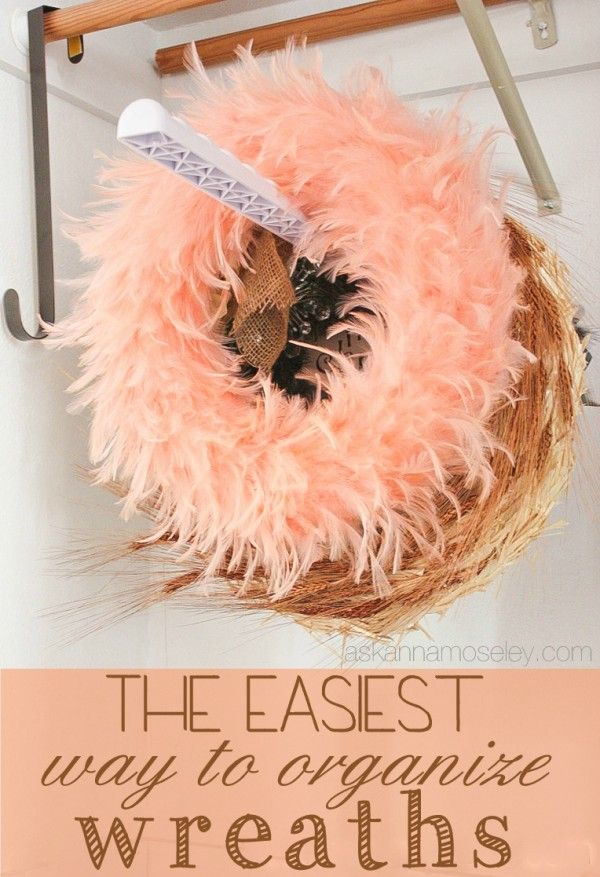 a bird nest with feathers and a knife stuck in it