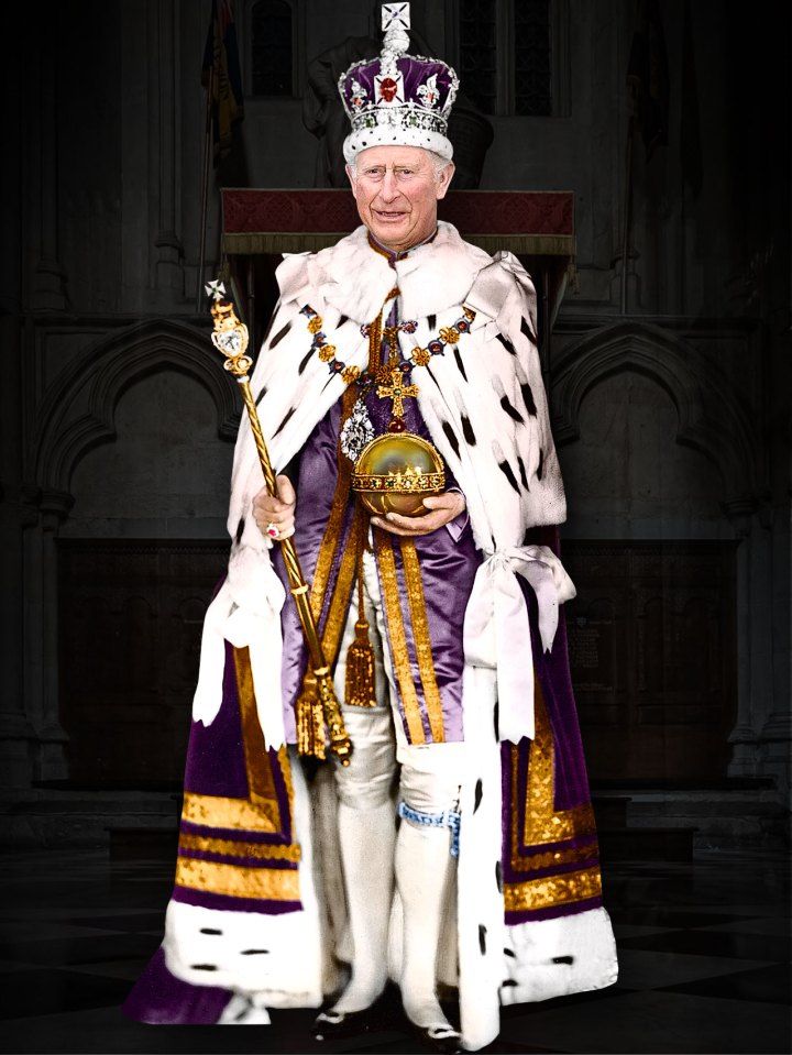 an older man dressed in white and purple