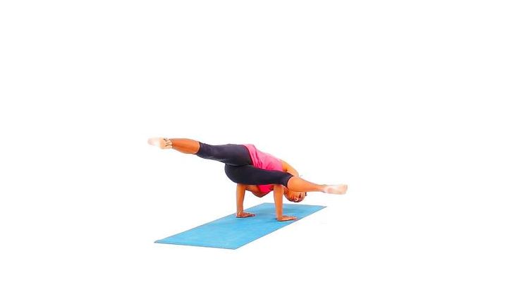 a woman is doing a yoga pose on a blue mat in front of a white background