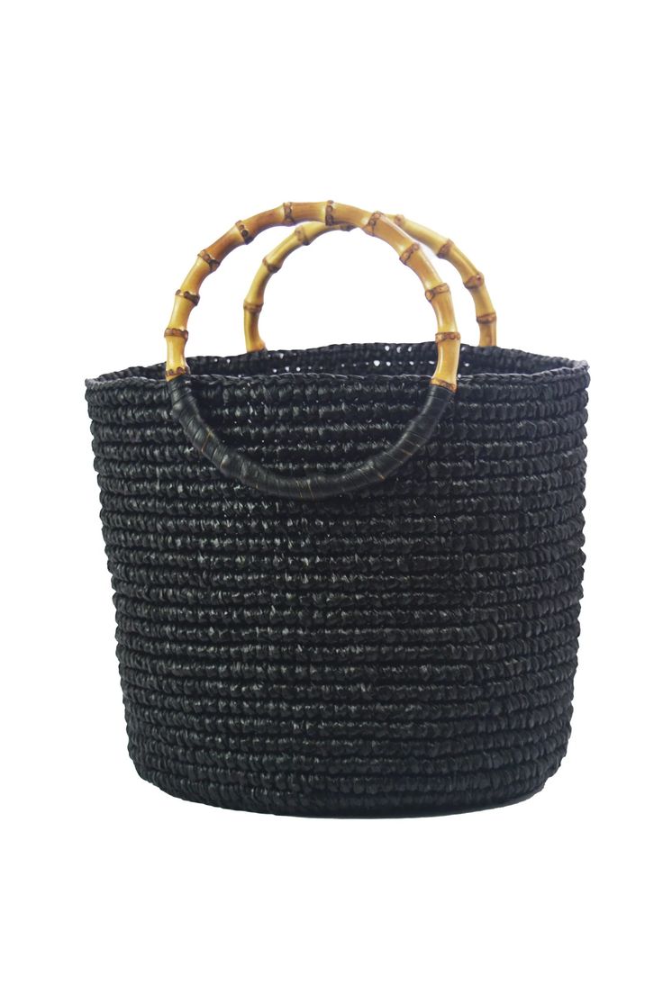 100% Toquilla straw with Bamboo handle.
This material is known for it's quality and beauty. Casual Crochet Straw Bag With Rolled Handles, Chic Open Weave Straw Bag For Market, Natural Fiber Bucket Bag With Bamboo Handle, Woven Bucket Bag With Top Handle In Natural Fiber, Summer Crochet Straw Bag With Bamboo Handle, Woven Straw Crochet Bag With Top Handle, Woven Bucket Bag With Top Handle, Natural Fiber Straw Bag With Bamboo Handle, Woven Straw Beach Bag With Top Handle