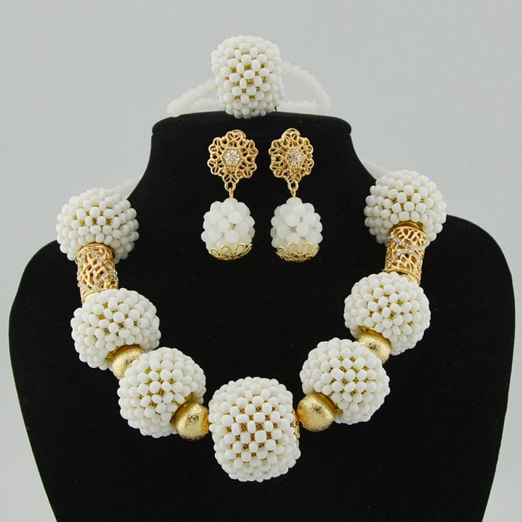 Make your wedding day truly memorable with our custom-made bridal jewelry set. Elegant White Beaded Jewelry, Elegant White Jewelry Sets For Brides, Elegant White Jewelry For Bride, Pearl White Wedding Jewelry, White Beaded Jewelry For Anniversary, Traditional White Pearl Jewelry, Elegant Beaded Jewelry For Wedding Gift, Traditional White Bridal Sets For Wedding, Elegant White Bridal Set