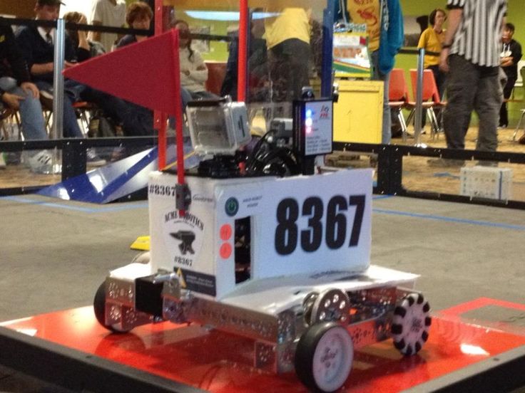 a robot car is on display at an event