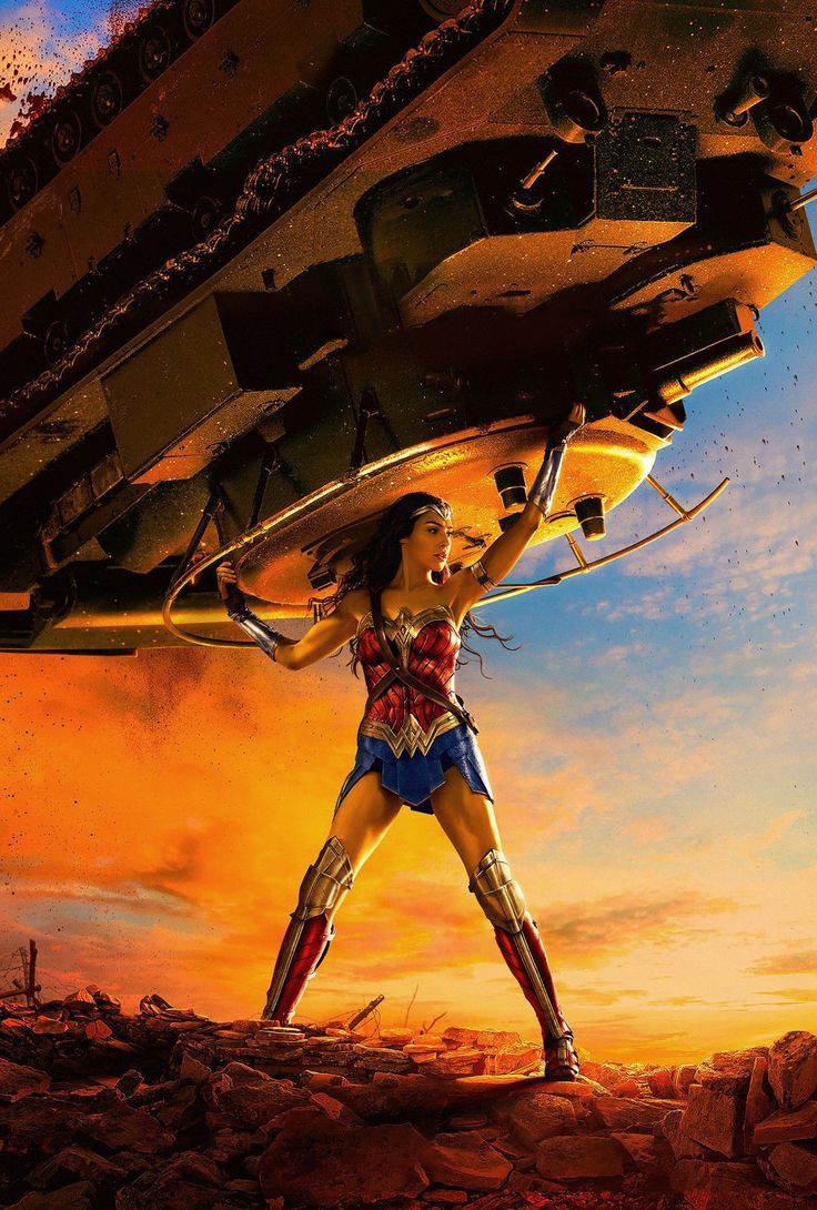 the poster for wonder woman is shown in front of an orange sky with clouds and rocks