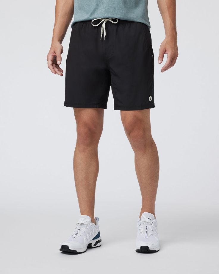 One short for every sport, the Kore Shorts have a classic athletic fit, falling just above the knee with an anywhere and everywhere versatility. Go commando in confidence with the breathable, boxer-brief liner.Also available in 5" and 9" inseam and unlined. | Vuori Kore Shorts | Black | XS Vuori makes premium performance apparel inspired by the active Coastal California lifestyle; an integration of fitness, surf, sport, and art. Breaking down the boundaries of traditional activewear, we are a ne Coastal California, Black Athletic Shorts, California Lifestyle, Black Camo, Athletic Men, Athletic Shirts, Black Xs, Performance Outfit, Black 7