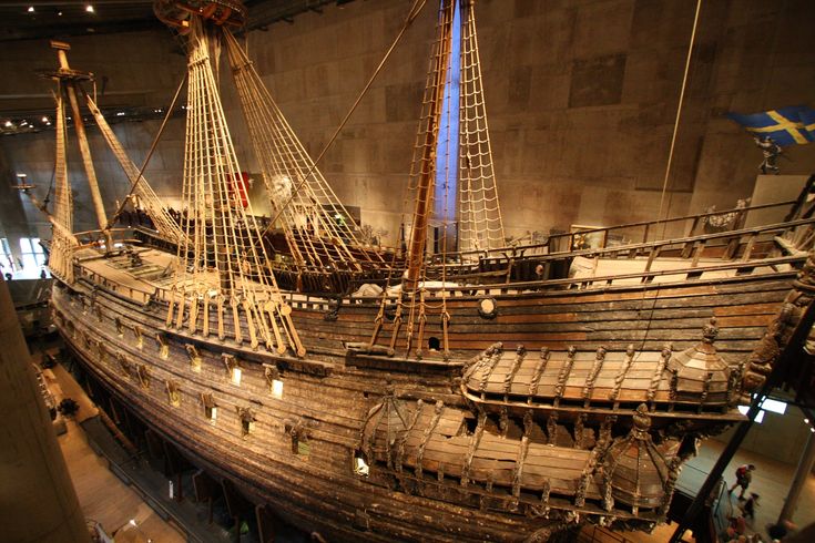 an old ship is on display in a museum