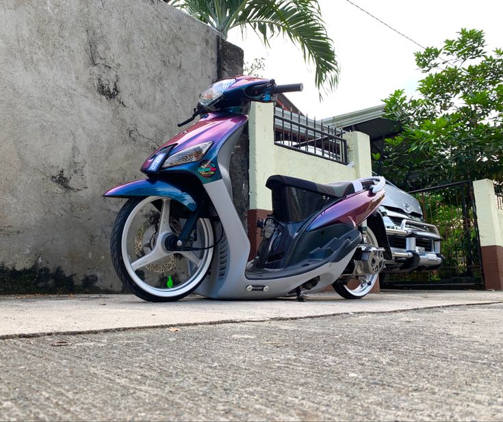 a motorcycle parked in front of a building