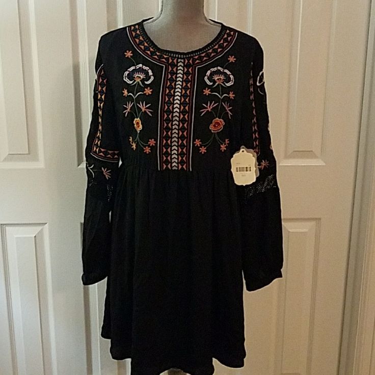 Nwt Altar'd State Dress Black With Embroidery Zips Up Back Never Worn Lined Excellent Condition Size: Large Long Sleeve With Button Closure Length: 32" Black Bohemian A-line Dress, Black A-line Bohemian Dress, Embroidered Long Sleeve Mini Dress For Fall, Long Sleeve Embroidered Mini Dress For Fall, Black Long Sleeve Embroidered Dress For Spring, Fall Black Embroidered Dress With Floral Embroidery, Black Floral Embroidered Dress For Fall, Black Embroidered Dress With Floral Embroidery For Fall, Casual Black Long Sleeve Embroidered Dress