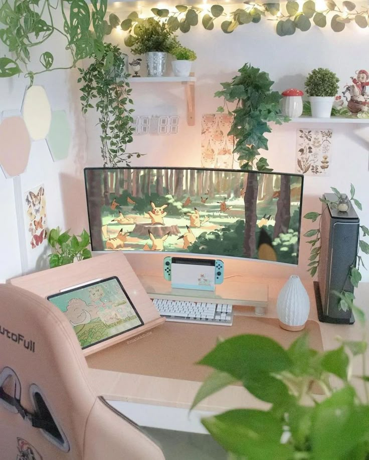 a desk with a computer monitor and keyboard on it, surrounded by potted plants