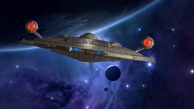 a star trek ship flying through space with planets in the background