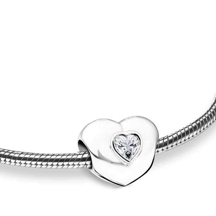 The Heart to Heart bead is the perfect piece to wear on either a bracelet chain. The message of love is loud and clear with the double heart design, making it a perfect memorial piece of cremation jewelry to remember a loved one. The pendant itself is a small heart-shape with soft edges and rounded curves, making it incredibly delicate and strikingly beautiful. Although the material of the necklace is sterling silver, it has been plated in rhodium, a precious metal material which gives added bri Memorial Beads, Cremation Bracelet, Message Of Love, Loud And Clear, Soft Edges, Heart To Heart, Bracelet Bead, Bracelet Chain, Cremation Jewelry