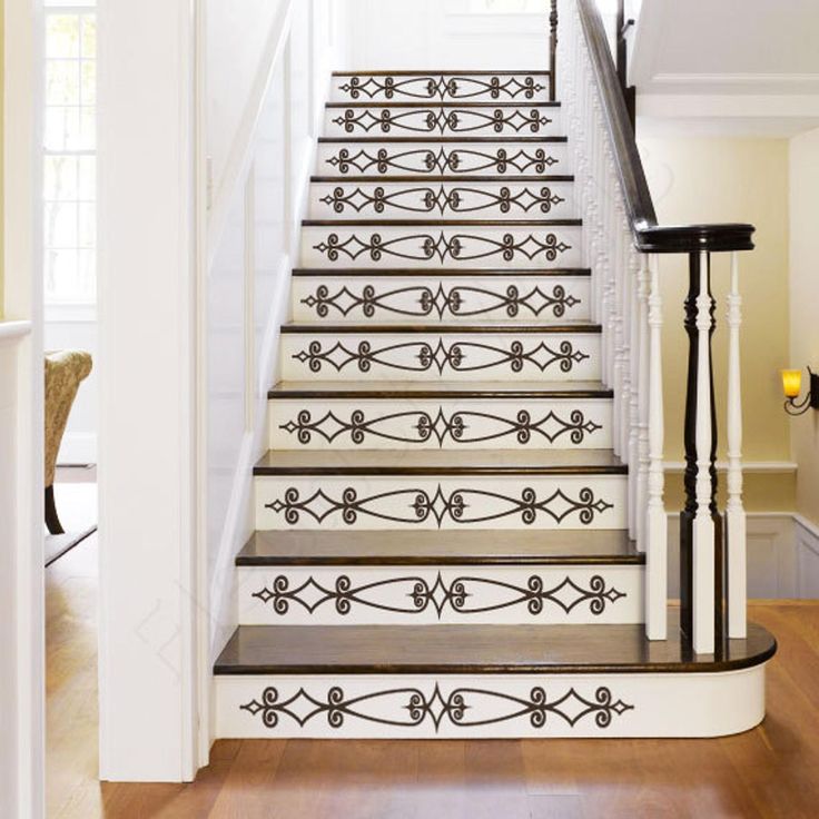 the stairs are decorated with black and white designs