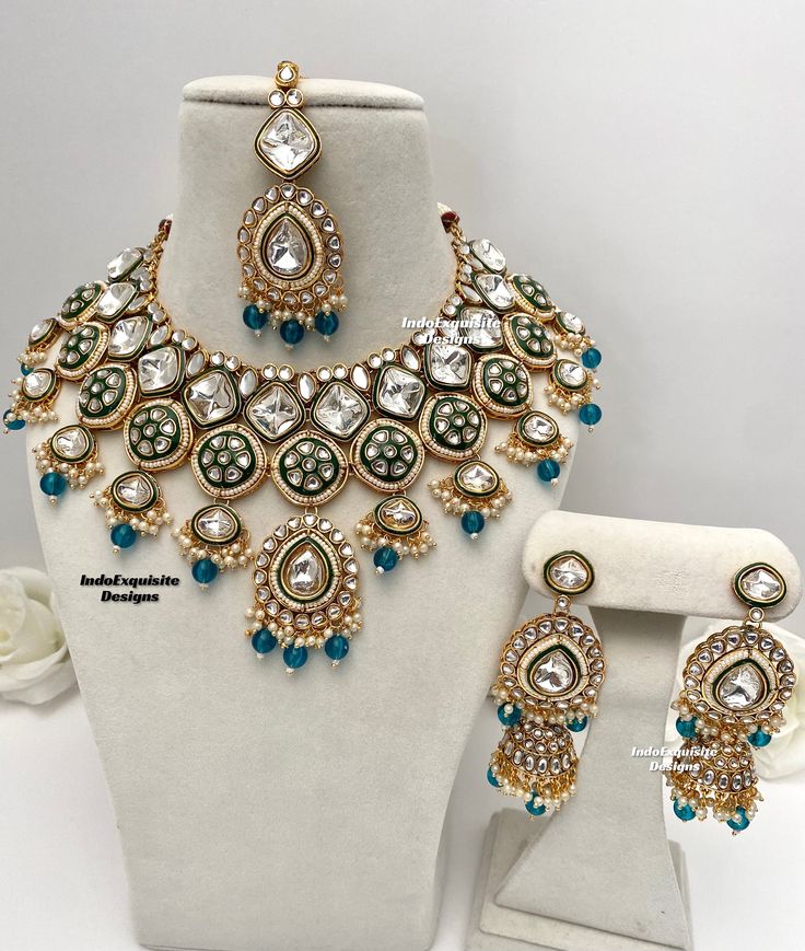 Premium quality Kundan Necklace comes with elegant Jhumki Earrings and Tikka/ Indian Jewelry/Premium Quality Polki and Kundan Jewelry/morepankhia/rama Green/peacock  All items are shipped from Brampton, Ontario, Canada. If you need your item by a certain day, please reach out to us for express delivery option before placing the order so that we can update the shipping for you. Standard shipping/delivery timeline Below are the delivery timeline estimates. We dispatch all orders by the next busine Kundan Jewelry Sets With Peacock Design, Kundan Jewelry With Peacock Design, Kundan Temple Jewelry Sets With Peacock Design, Bollywood Style Round Peacock Design Jewelry, Traditional Kundan Jewelry Sets With Peacock Design, Kundan Jewelry Sets With Peacock Design For Diwali, Bollywood Kundan Jewelry Sets With Peacock Design, Diwali Kundan Jewelry Set With Peacock Design, Festive Bollywood Jewelry Sets With Peacock Design