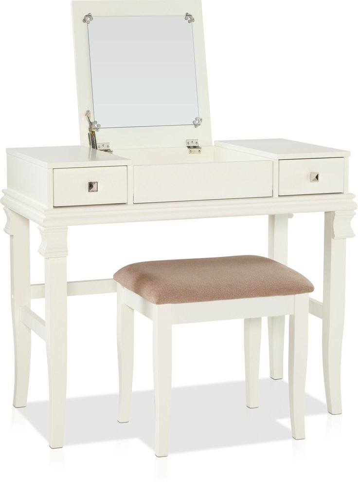 a white dressing table with a stool and mirror on the top, in front of a white background