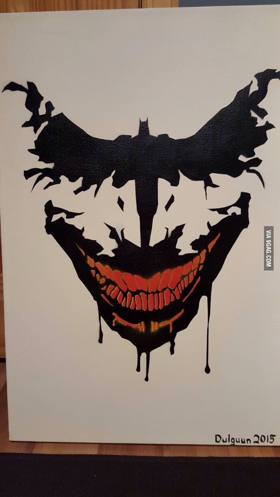 an image of the joker face with blood dripping from it