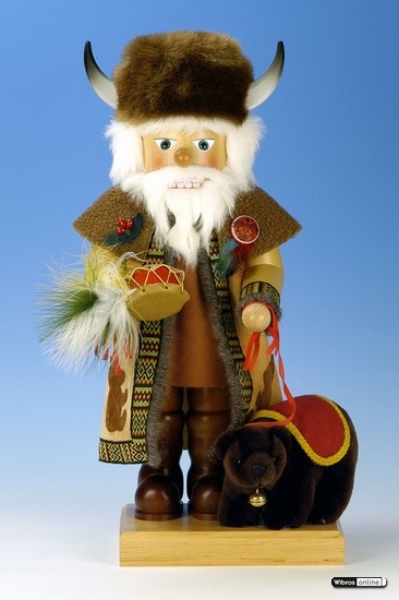 a figurine of a man with long white hair and beard