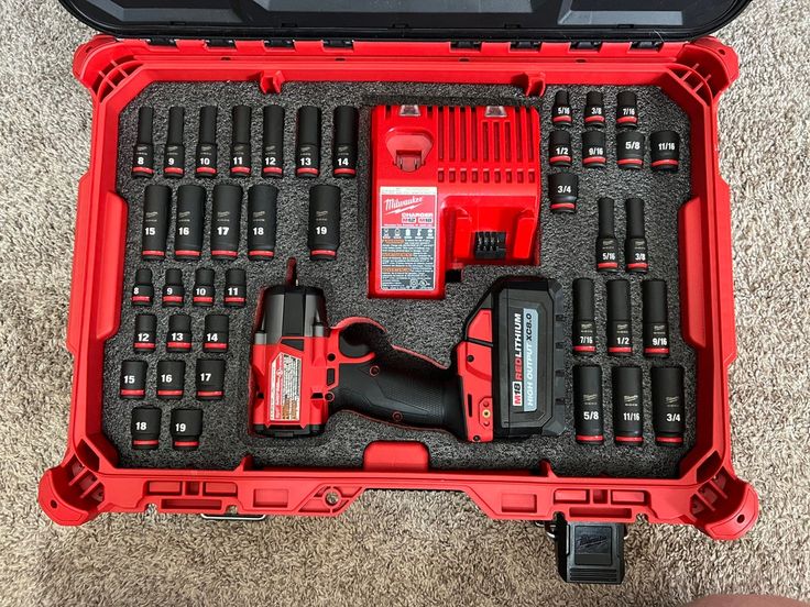 a red tool box filled with lots of tools