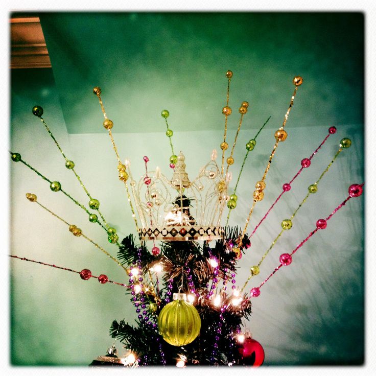 a christmas tree decorated with ornaments and lights