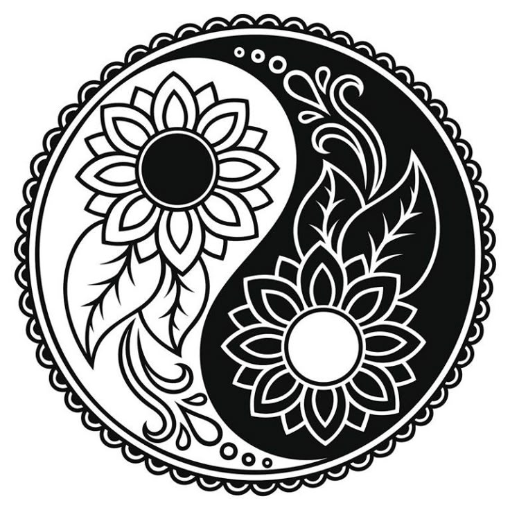 a black and white yin yang symbol with flowers