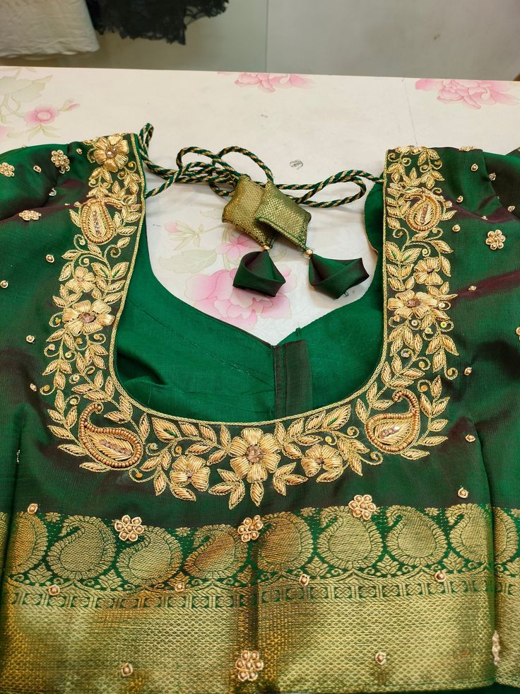 Fabric used raw silk nd lining cotton hand embroidered blouse ready to wear blouse. Bollywood Style Cotton Silk Blouse Piece With Floral Embroidery, Festive Embroidered Sleeveless Blouse, Green Art Silk Blouse With Intricate Embroidery, Elegant Chanderi Blouse With Floral Embroidery, Anarkali Top With Resham Embroidery In Cotton Silk, Silk Anarkali Embroidered Top, Green Embroidered Long Sleeve Blouse, Traditional Sleeveless Blouse For Festive Occasions, Festive Sleeveless Embroidered Blouse