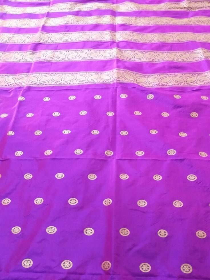 This Banarasi handloom pure silk lehenga is a perfect festive/wedding/occasional wear it enhanced with purple color motifs.  Occasion: party wear/wedding  Materials. Pure silk. Unstich  Fabric design - Banarasi shikargah lehenga  Pattern: paisley/buti motifs.  Borders: yes  Border type: Zari  Zari type: golden zari  Fabric length with blouse and with dupatta.  Borders is 6.5 meters  Blouse: 0.85 Meters  No of kali: 18 Size of kali 42 inch  No of border in dupatta 9 Purple Anarkali Traditional Handloom Wear, Purple Silk Sharara For Navratri, Purple Silk Sharara With Pallu, Traditional Purple Sharara For Festive Occasions, Purple Chanderi Sharara With Traditional Drape, Purple Chanderi Sharara With Pallu, Purple Chanderi Traditional Wear For Navratri, Traditional Purple Sharara With Dupatta, Purple Traditional Drape Sharara