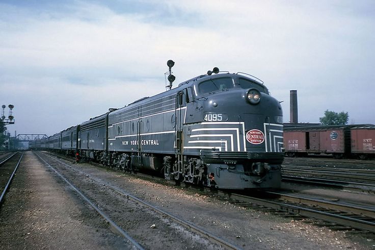 a train is traveling down the railroad tracks