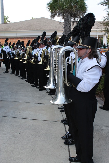 a marching band is lined up with their instruments